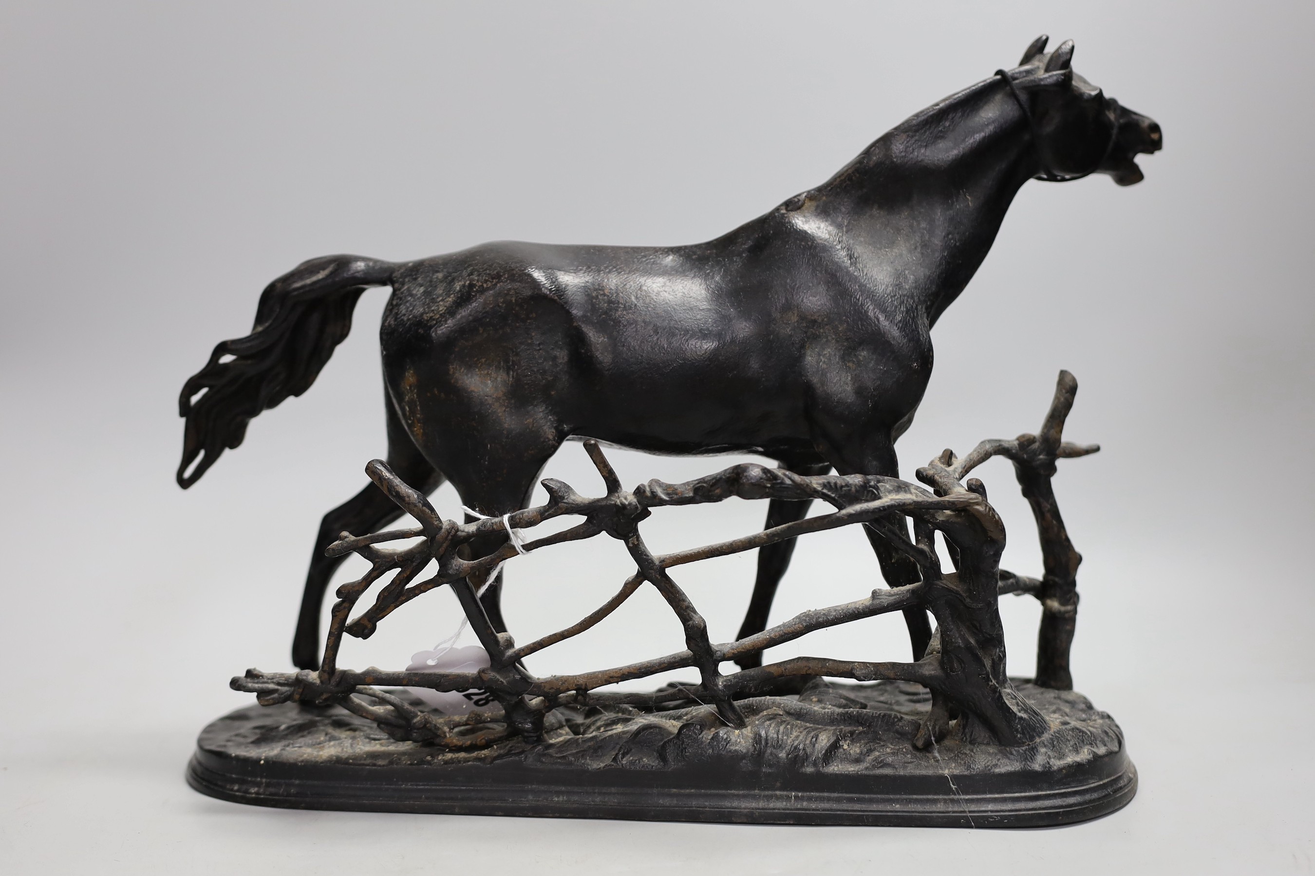 A Russian black painted cast iron horse model, maker’s mark to base. 42cm long